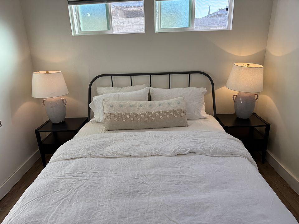 Comfy queen mattress with linen sheets, down duvet, lots of natural light, and blackout shades for when you want to sleep late.