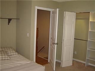 2nd Upstairs bedroom with custom closet, NEW doors, carpet, trim & paint!