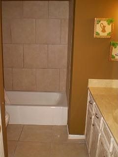 Bathroom upstairs. New light fixture and updated 2007.