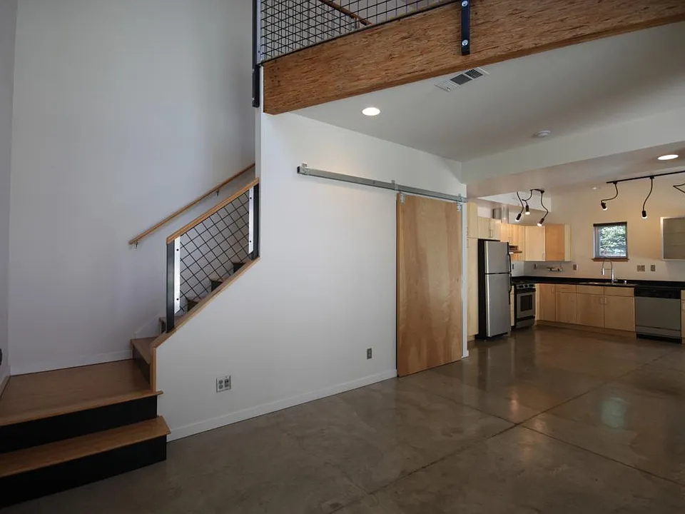 stairs living room kitchen