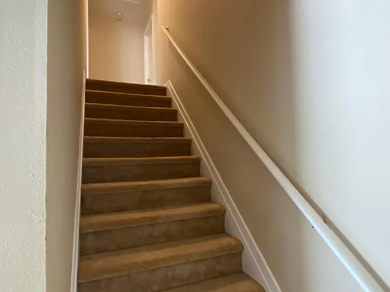Staircase to bedrooms upstairs