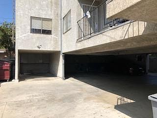 Carport for two cars.. light storage in front of car