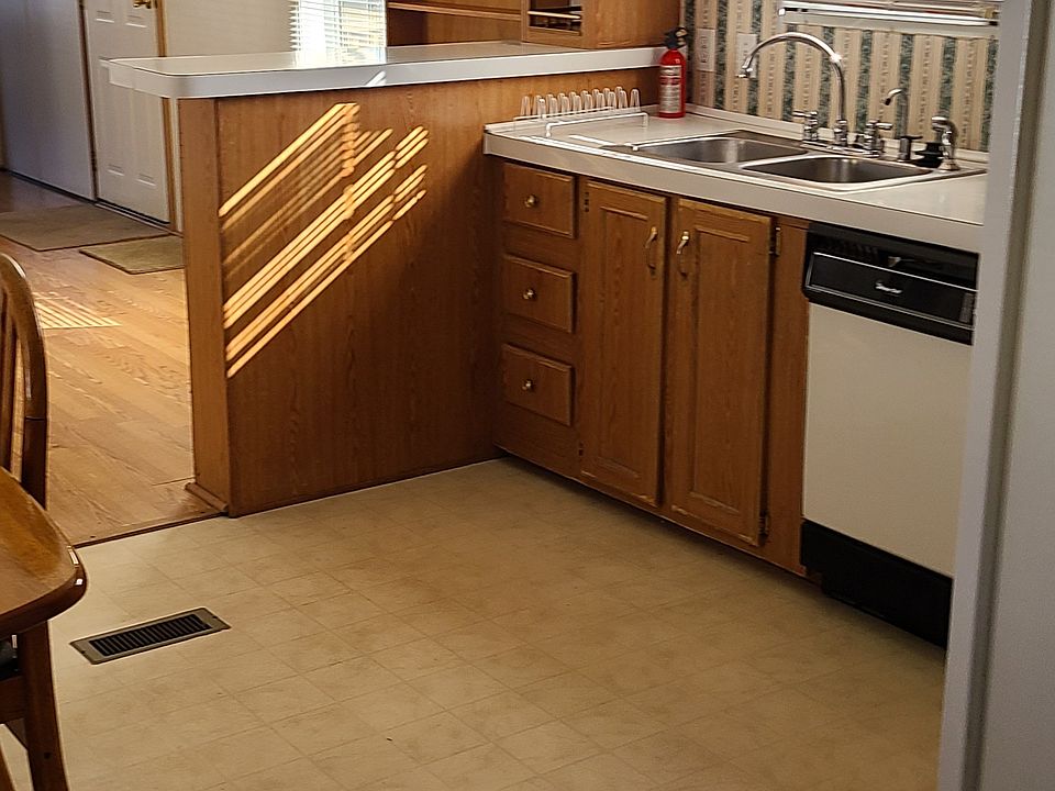 kitchen area with dishwasher