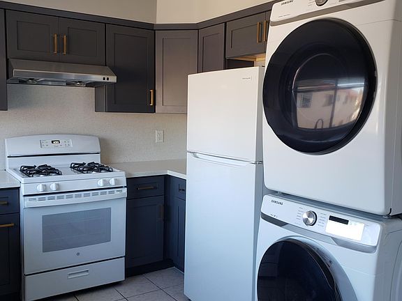New gas range and refrigerator.