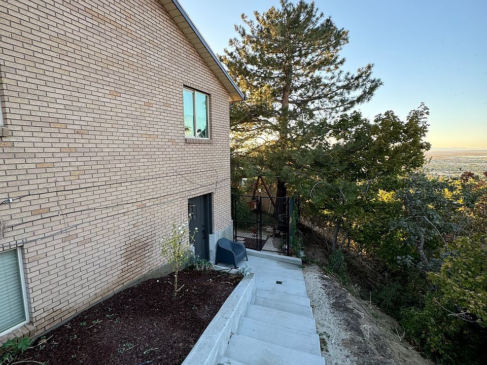 Side of house, entry to basement apartment