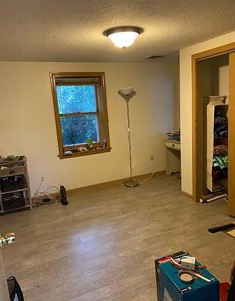 Bedroom 1 w/ Closet (includes built in shelving)