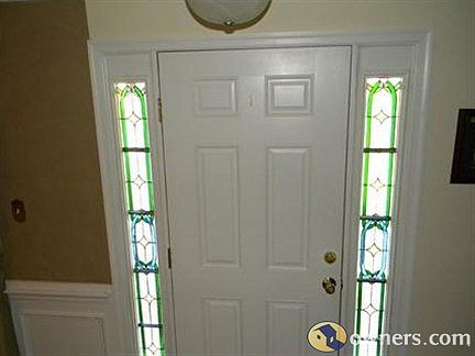 front door with stain glass sidelights