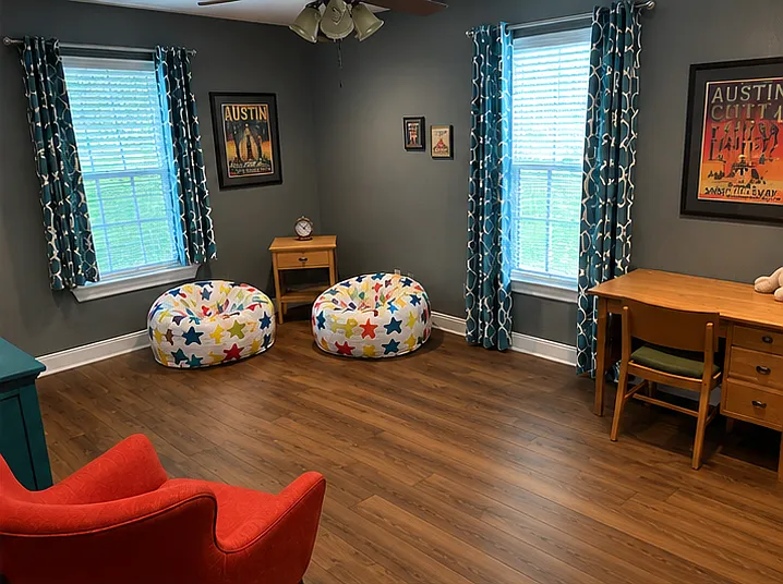 AI adjusted photo to show the upgrade to LVP flooring. NO carpet in the house.