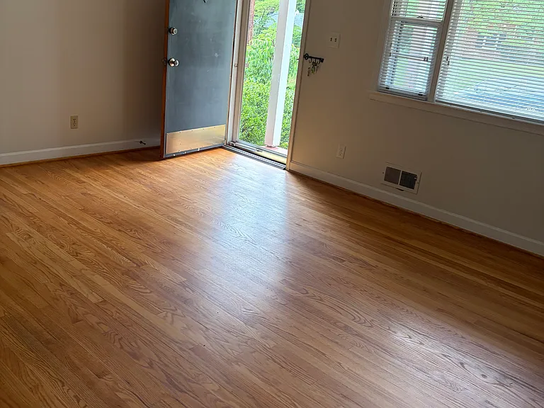 Front Door opens to this large family room area with hardwood floors.