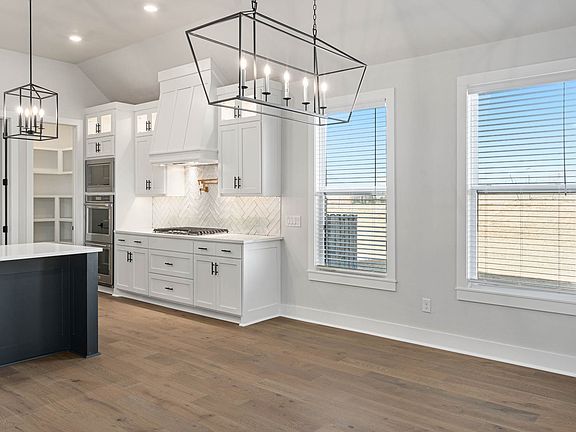 The dining space sits adjacent to the kitchen.