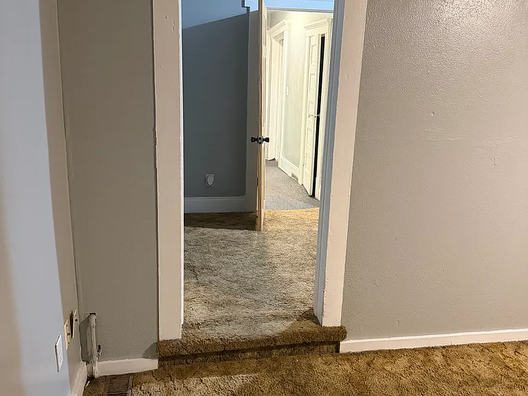 Master bedroom exit to closet and nursery/office area