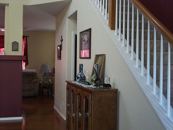 Entry shows hardwood floors!