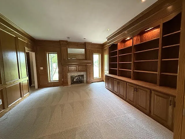 Main Floor suite with private home office and new carpet