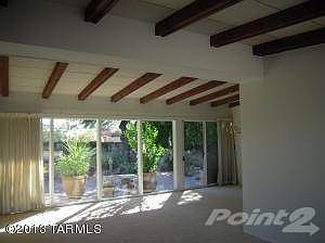 Wall of windows in living room