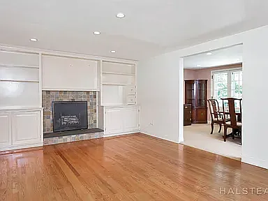 Furniture shown in the dining room beyond is not present currently. This was a photo taken at the time of move-in.
