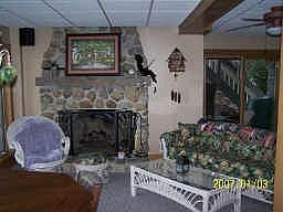 Family room with patio, gas fireplace and wet bar