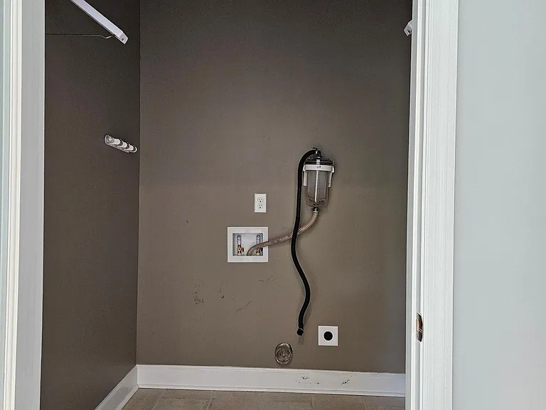 Laundry room, upgraded lighting and filtrol filter system for washer.