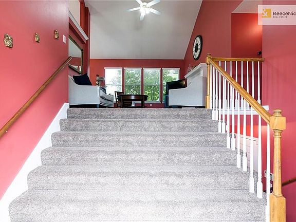 Spacious entry takes you up to the living room