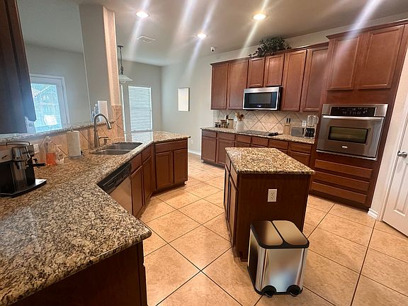 Kitchen 

(Furniture is virtually staged for reference)