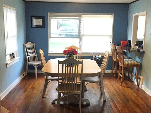 Large dining room with breakfast bar.