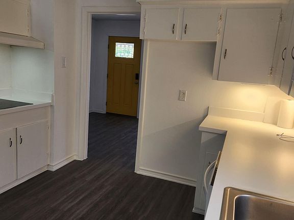 From the kitchen with a view of the front door