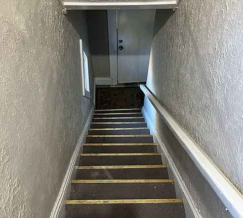 About 15 steps into the upstairs units.