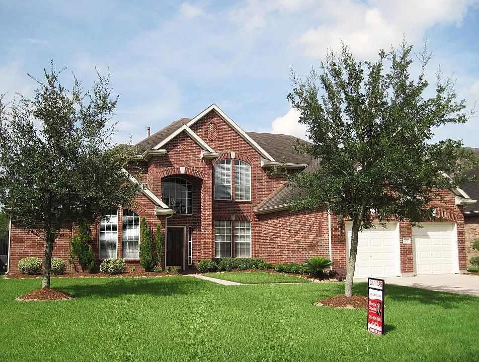 Classic red brick executive home in gated community