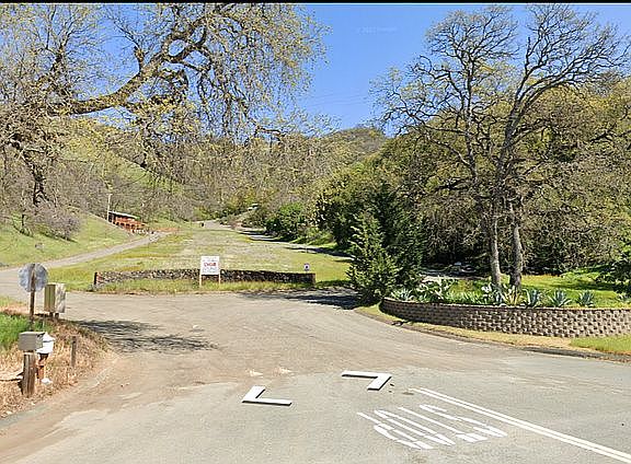 Community entrance at Hwy 20