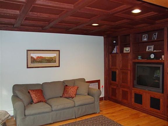 Family room with coffered ceiling.