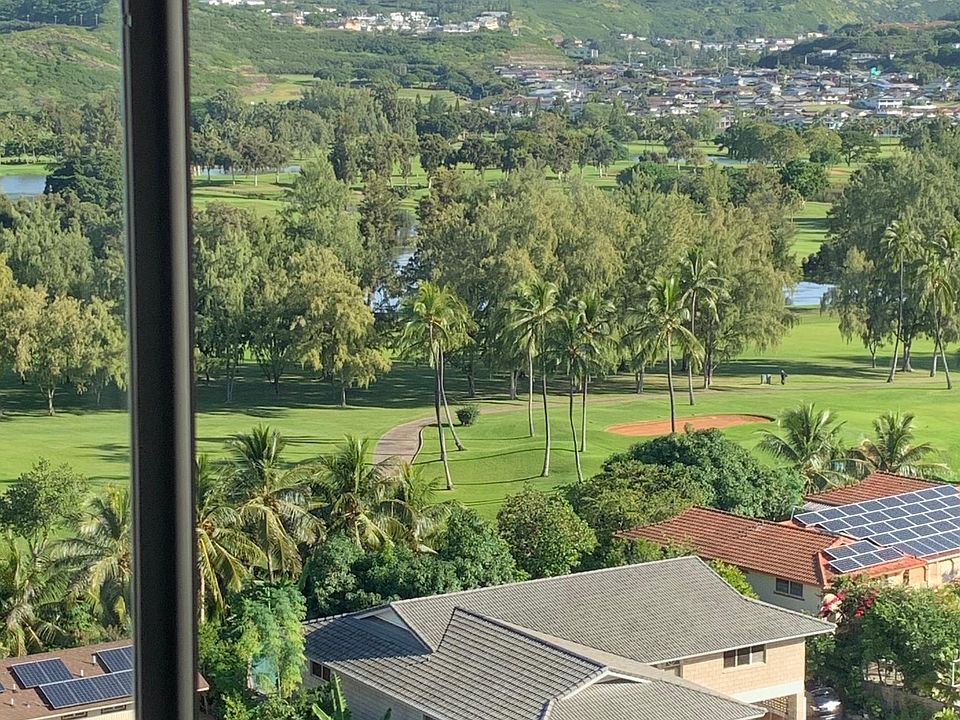 Wide view of the golf course as you enter the apartment.