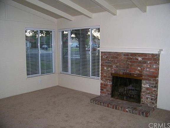 living room, fireplace, open beem ceilings