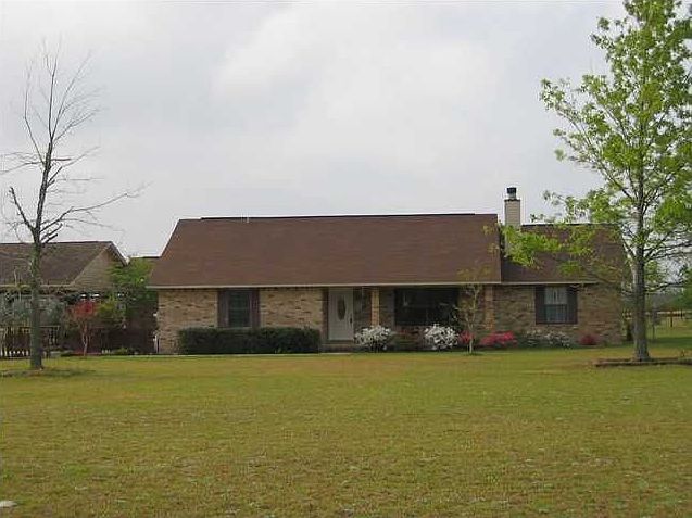 Peaceful settings surround this Jay home.