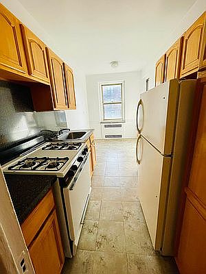 1st image of 64-48 Booth St #404