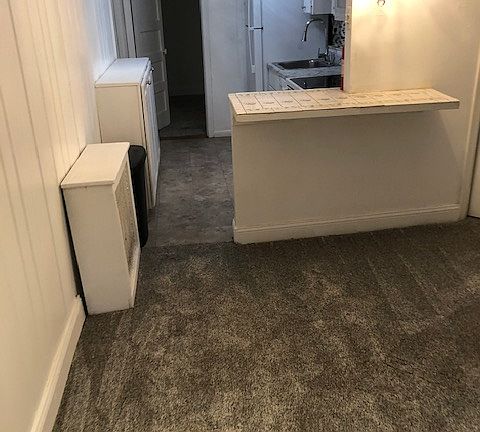 view of kitchen through living room