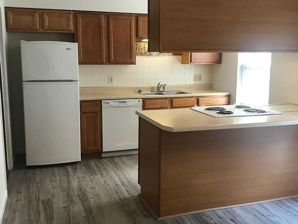 Kitchen complete with all appliances, new flooring and washer dryer hook up to the left of kitchen in separate laundry closet.