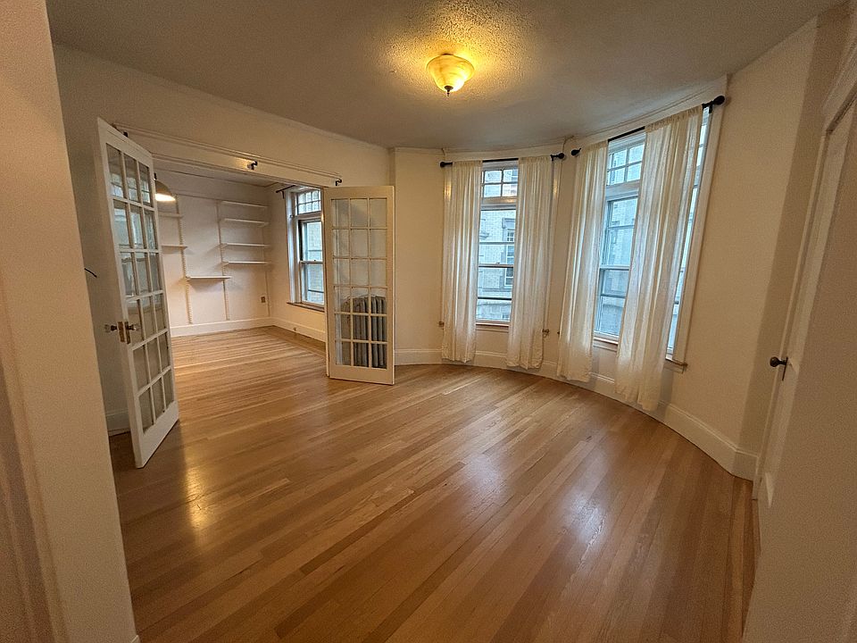 Living room looking into separate dining room/office