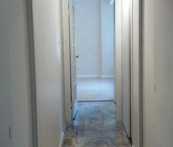 Hallway to bathroom and bedroom