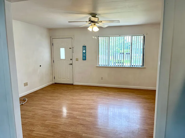 Looking from the kitchen to the front room.