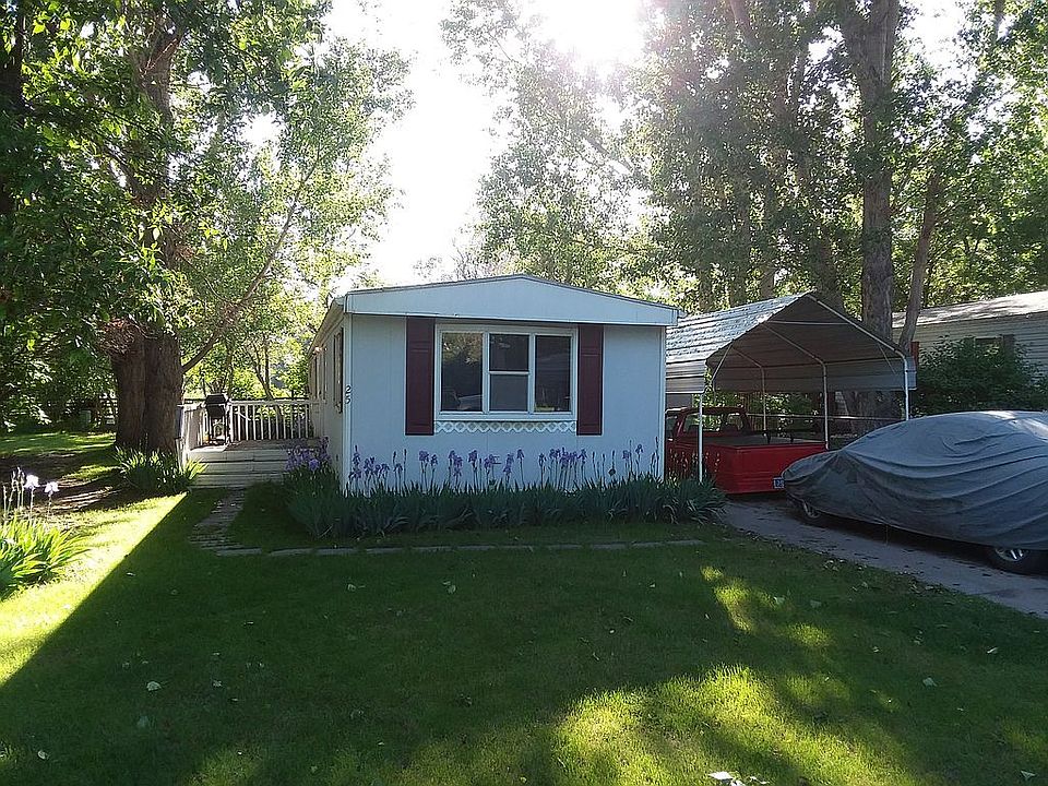 3 Car Driveway with Carport!