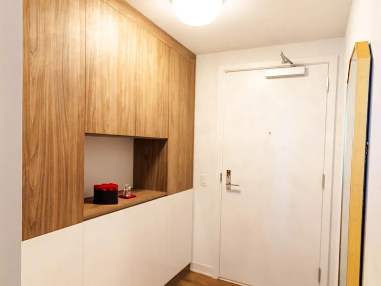 One-of-a-Kind Custom Entrance Storage Designed by the Owners
