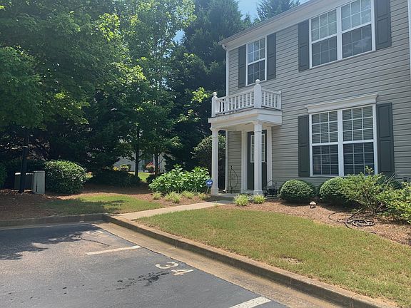Front of condo with two dedicated parking spaces.