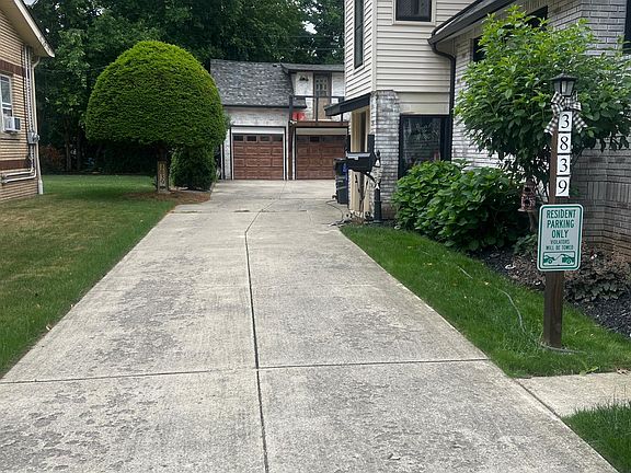 1st garage with electric remote and one space for company to park