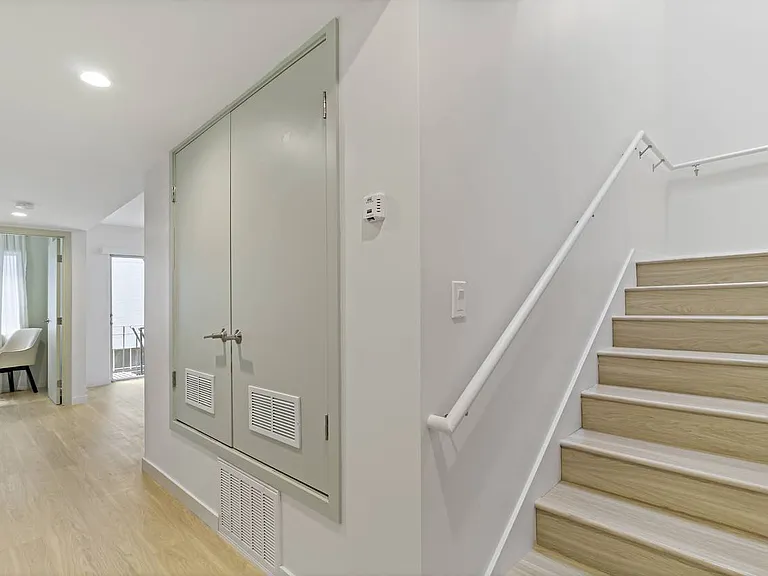 stairs to bedrooms on 3rd floor