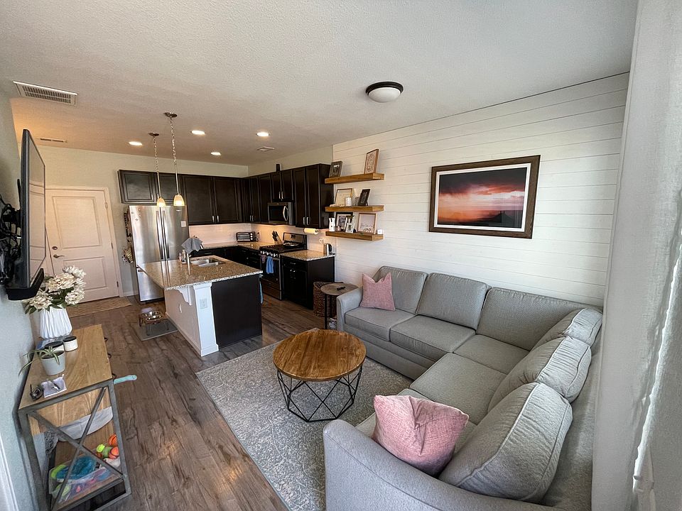 Open concept living room, kitchen, and dining room