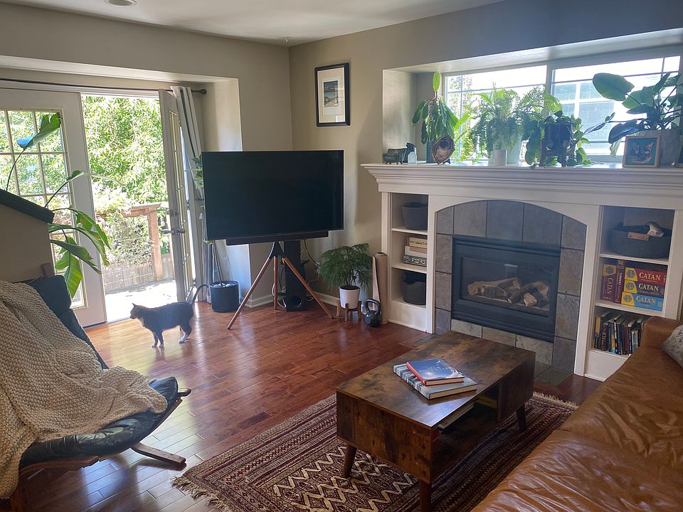 Kitchen open to living area with gas fireplace for those chilly PNW winters.