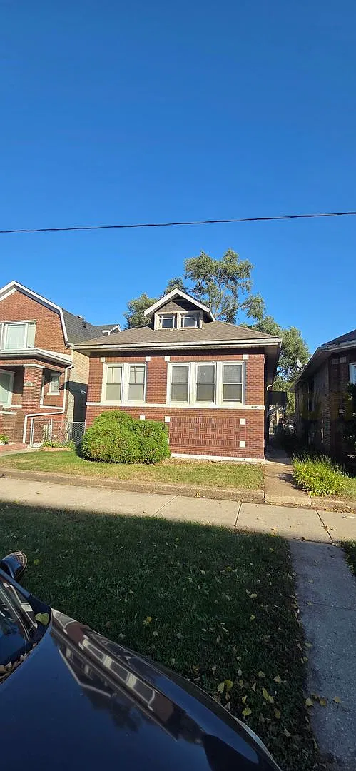 5-Bedroom, 2-Bath Brick Bungalow with Hardwood Floors and Finished Basement — Photo 2