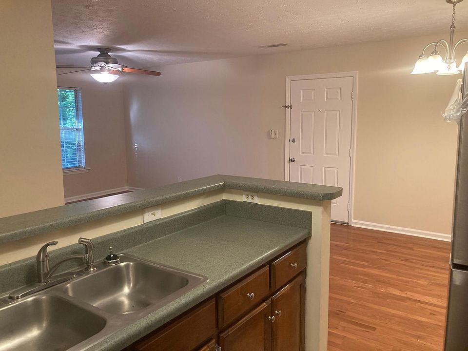 Open kitchen, dining, and living area.
