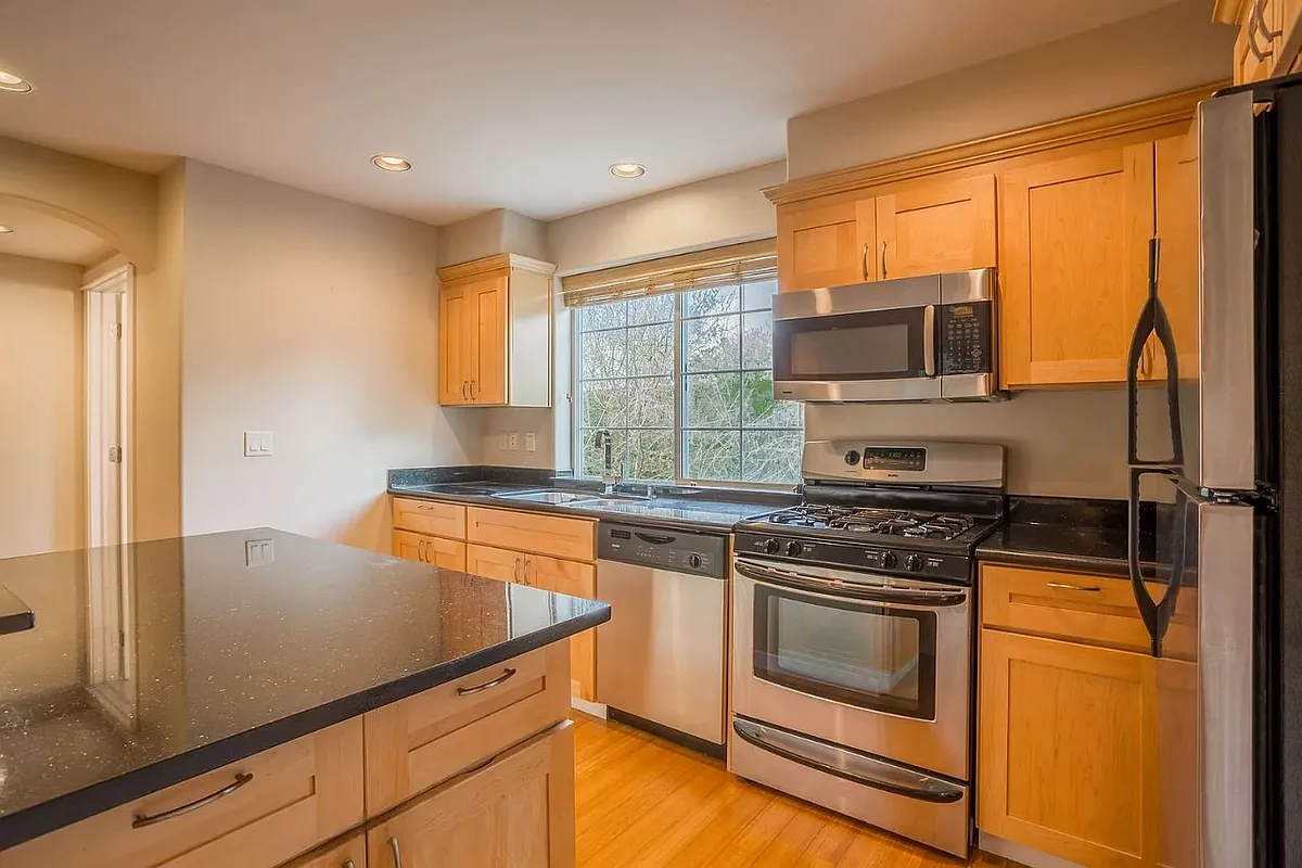 Kitchen with lots of natural light and Large Island - 1207 S Lucile St #B