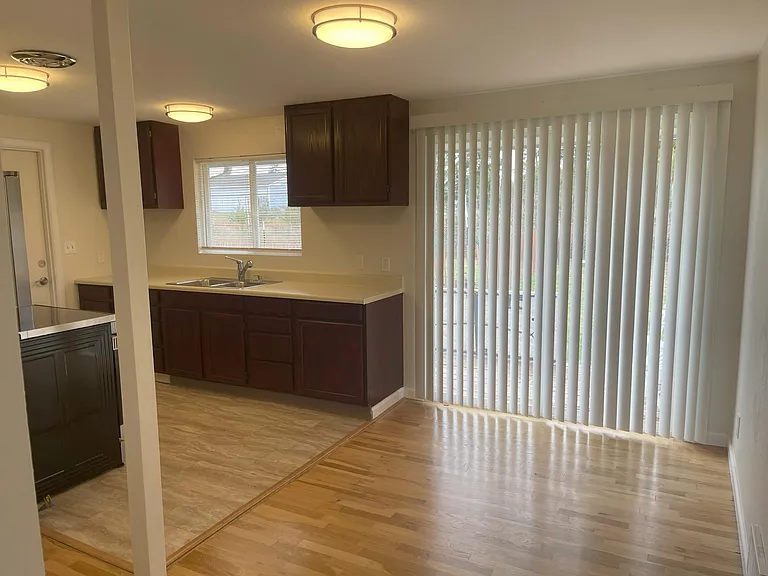 Kitchen with Eating Area and Sliding Doors to rear deck and yard