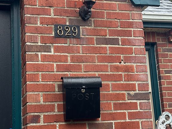 Front door, exterior light has a timer to go on automatically at dusk and off at dawn.